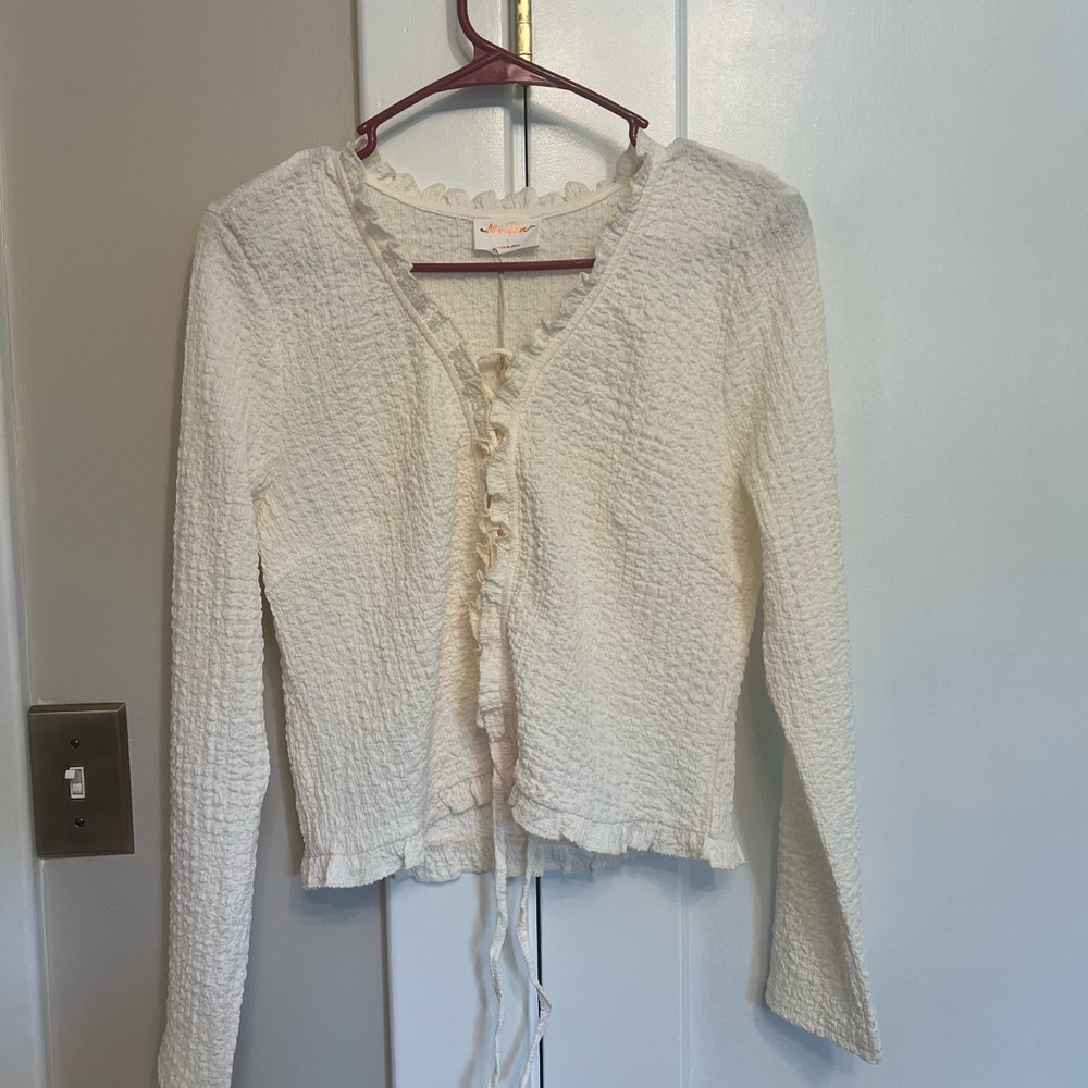 Elegant Cream Blouse with Ruffle Detail